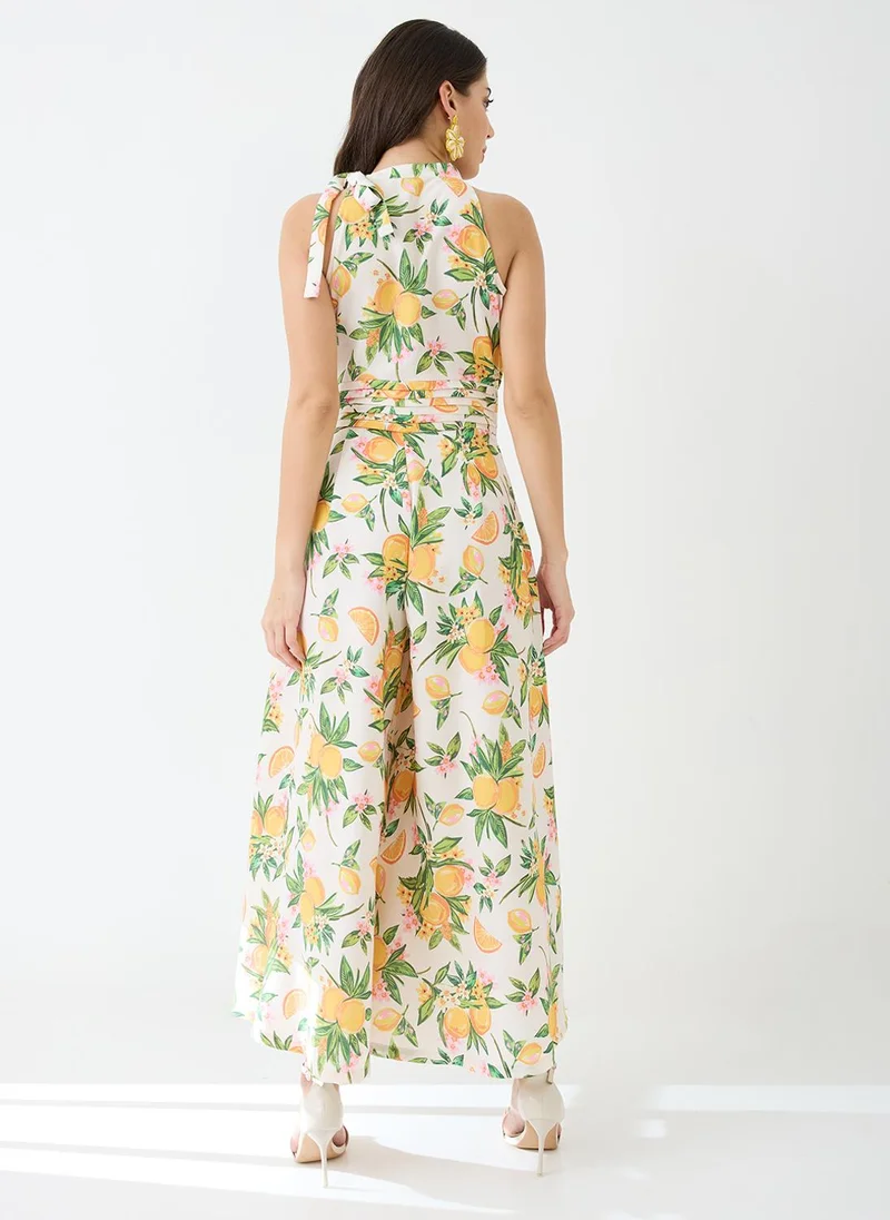 globus Yellow Globus Women Yellow Floral & Fruit Print Halter Neck Pleated Detail Flared Fusion Jumpsuit for Women | Best Price UAE